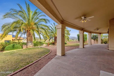 Set on a quiet street with sweeping views of Four Peaks and Red