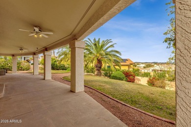 Set on a quiet street with sweeping views of Four Peaks and Red