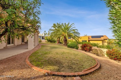 Set on a quiet street with sweeping views of Four Peaks and Red