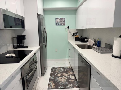 beautiful one bedroom 11/2 bathroom totally renovated condo on