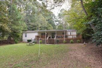 Very level lot with good water, home has had lots of updates - Lake Home For Sale in Eatonton, Georgia