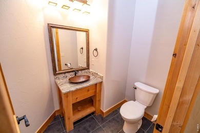 Perched to capture breathtaking mountain views in the - photo 12