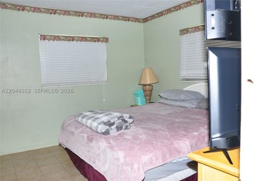 Nestled on a spacious corner lot, this charming 4 bedroom/2 - photo 12