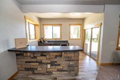 Perched to capture breathtaking mountain views in the - photo 30