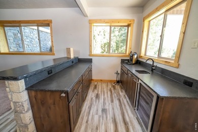 Perched to capture breathtaking mountain views in the - photo 31