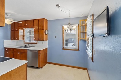 Welcome to this all-brick ranch home! The bright sunny living - photo 5