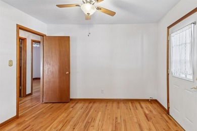 Welcome to this all-brick ranch home! The bright sunny living - photo 8