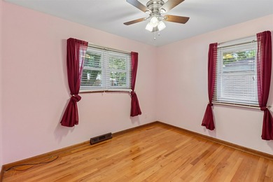 Welcome to this all-brick ranch home! The bright sunny living - photo 9