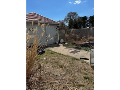 Investor special! 4-bedroom, 2-bath property situated on a - photo 5