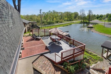 Welcome to Blue Heron Cove! This prestigious, tree-lined street - photo 1
