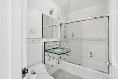 Welcome to Residence 15L at Towers at Water's Edge, a bright - photo 12