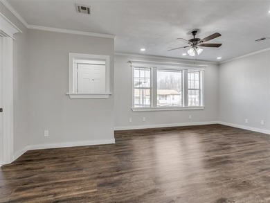 Completely remodeled and move-in ready! This charming