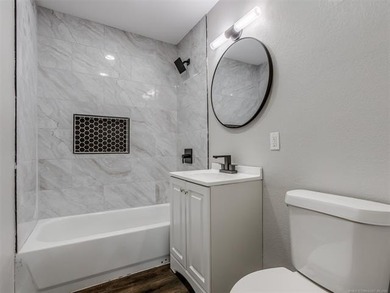Completely remodeled and move-in ready! This charming