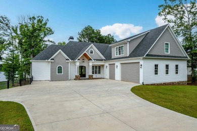 Discover your dream retreat in the exclusive gated community of - Lake Home For Sale in Eatonton, Georgia