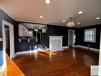 Welcome to 1303 Oakgrove Ave, a beautifully updated 3-bedroom