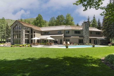 Set on 6.7 pristine acres along the Big Wood River and bordering - photo 13