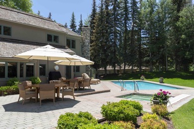 Set on 6.7 pristine acres along the Big Wood River and bordering - photo 14