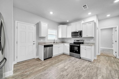ASSUMABLE MORTGAGE RATE OF 3.25% AVAILABLE! Newer-Built - photo 16