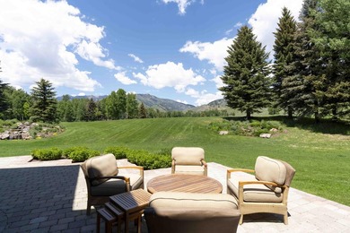 Set on 6.7 pristine acres along the Big Wood River and bordering - photo 16
