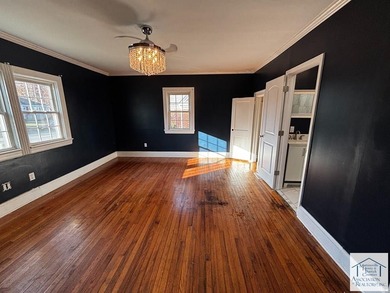 Welcome to 1303 Oakgrove Ave, a beautifully updated 3-bedroom