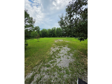 Discover this beautiful 0.79-acre vacant lot located in the - photo 2