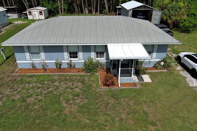 This marvelous custom-built CBS pristine, furnished home on .27 - photo 2
