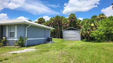 This marvelous custom-built CBS pristine, furnished home on .27 - photo 3