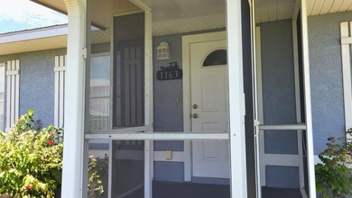 This marvelous custom-built CBS pristine, furnished home on .27 - photo 8