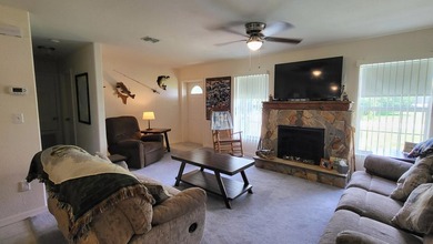 This marvelous custom-built CBS pristine, furnished home on .27 - photo 10
