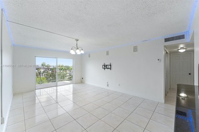 Nestled on the sixth floor, this cozy two-bedroom, two-bathroom