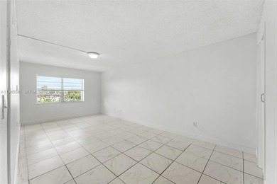 Nestled on the sixth floor, this cozy two-bedroom, two-bathroom