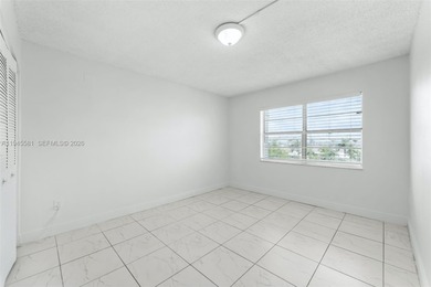 Nestled on the sixth floor, this cozy two-bedroom, two-bathroom