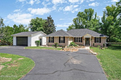 Lakefront brick home offering one-level living with numerous - photo 1