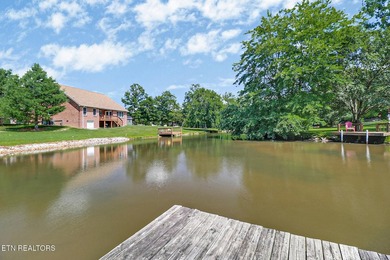 Lakefront brick home offering one-level living with numerous - photo 3