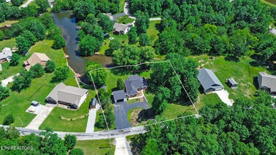 Lakefront brick home offering one-level living with numerous - photo 5