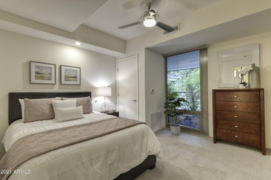 Gorgeous corner condo with extensive floor to ceiling glass and