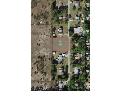 This spacious 1/2-acre lot offers the perfect setting to build - photo 1