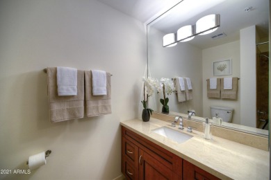 Gorgeous corner condo with extensive floor to ceiling glass and