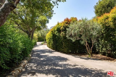 Nestled along prestigious Picacho Lane, this newly renovated - photo 2