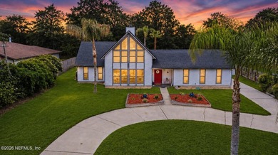 Nestled on a beautiful one-acre homesite in sought-after Lake - photo 1