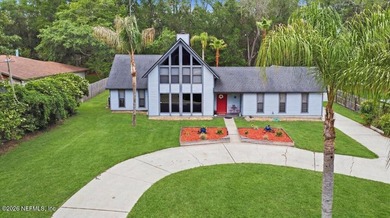 Nestled on a beautiful one-acre homesite in sought-after Lake - photo 2