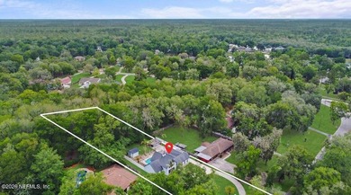 Nestled on a beautiful one-acre homesite in sought-after Lake - photo 3