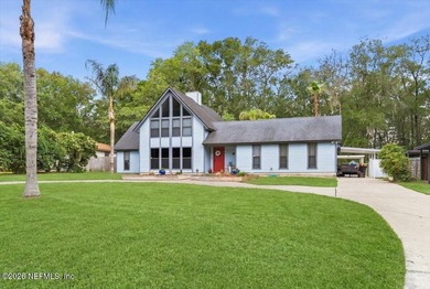 Nestled on a beautiful one-acre homesite in sought-after Lake - photo 5