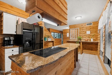 Nestled on a beautiful one-acre homesite in sought-after Lake - photo 9
