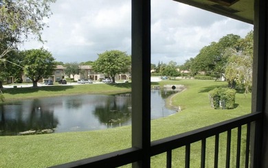 Welcome to this 2-bedroom, 2-bathroom waterfront condominium in - photo 1