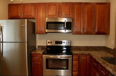 Welcome to this 2-bedroom, 2-bathroom waterfront condominium in - photo 3
