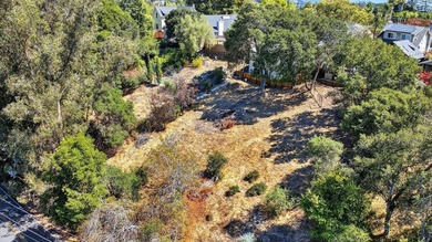 This conforming R-1-5 zoned lot offers a rare chance to build in - photo 2