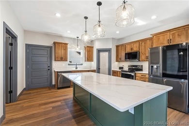 Experience lake living with sweeping views of the 5MM from this - photo 13