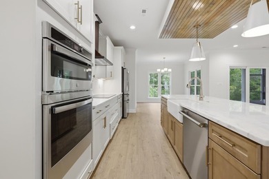 Welcome to 903 Inlet View Drive in the coveted gated community - photo 14