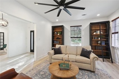 Thoughtfully renovated in 2021, this Canal Blvd residence blends - photo 5